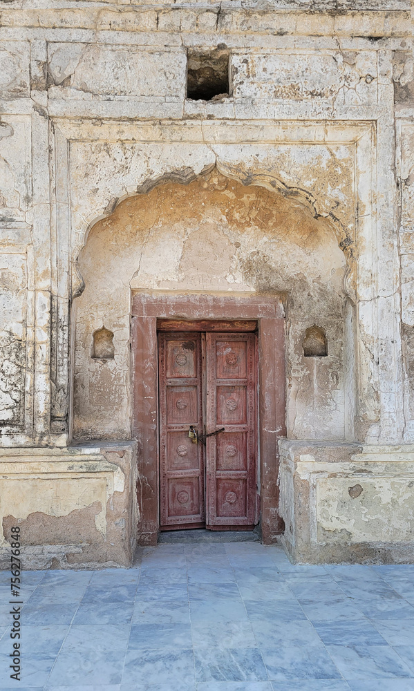 Old wooden door in a wall, Katas raj temple door