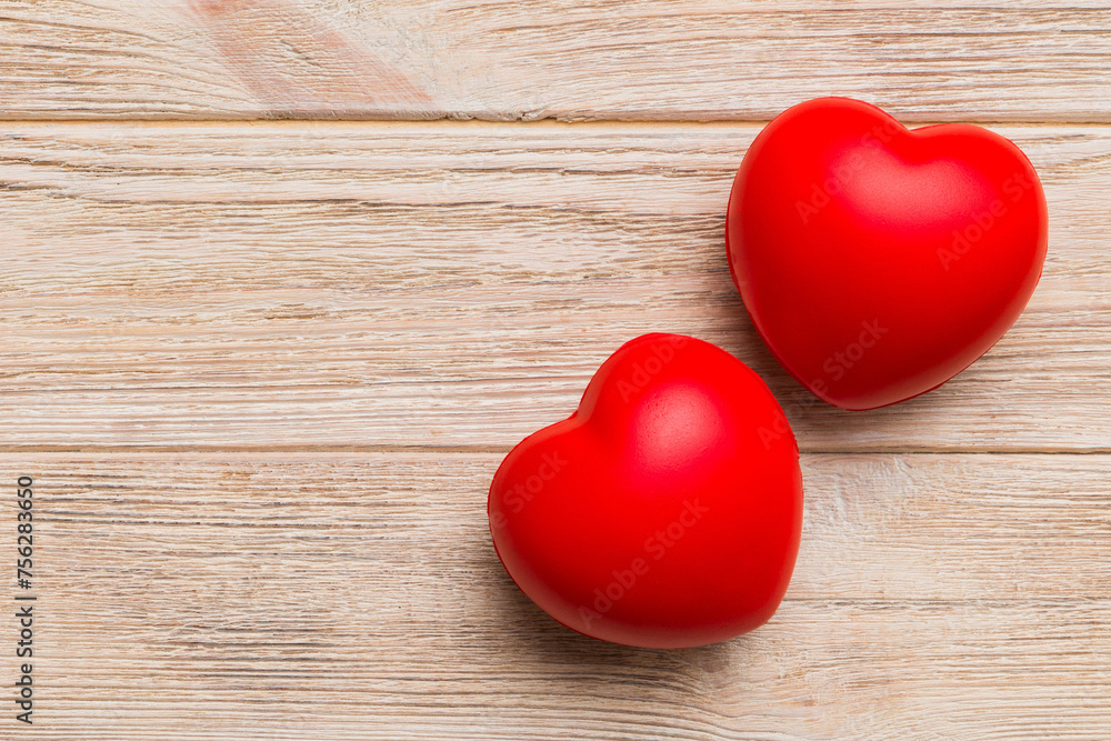 red heart shape on colored background. minimal concept top view with copy space red heart shape on colored background. minimal concept top view with copy space