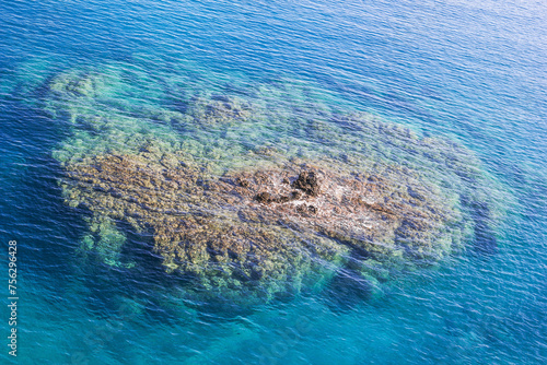 Aerial view of the rocks under the crystal clear blue sea. Mediterranean sea, Cirali, Antalya Province in Turkey. © Nadezhda Zaitceva