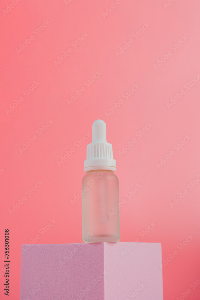 Plastic white tube for cream or lotion. Skin care or sunscreen cosmetic with stylish props on pink background. Plastic white tube for cream or lotion. Skin care or sunscreen cosmetic with stylish props on pink background.