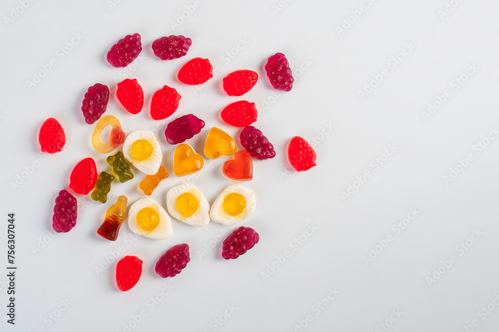 Assorted gummy candies. Top view. Jelly sweets. on white background Assorted gummy candies. Top view. Jelly sweets. on white background