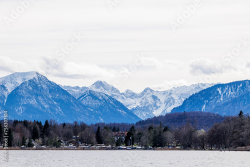 View over the Staffelsee in Bavaria from Uffing to the opposite shore and the Kochel mountains in the Alps