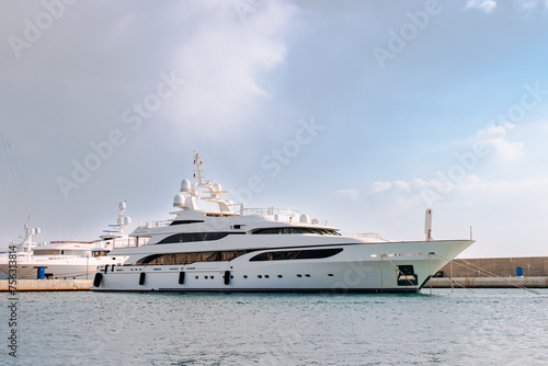 Luxury Motor Yacht docked in the port © Doralin