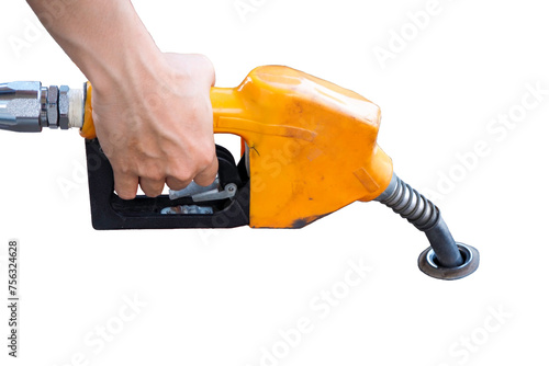 Gas pump held by hand with nozzle, alongside drill, tools, and worker in construction setting photo