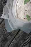 Bouquet of marshmallow dumplings. Marshmallow dumplings. Homemade marshmallows. on a wooden background. Place for text.