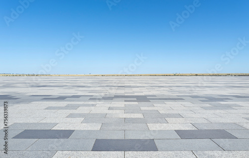 Empty concrete floor with blue sky