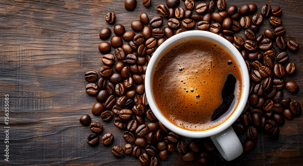 A cup of Americano coffee with coffee beans spread on one side on a table with a textured wood texture. Top view.
A cup of Americano coffee with coffee beans spread on one side on a table with a textured wood texture. Top view.