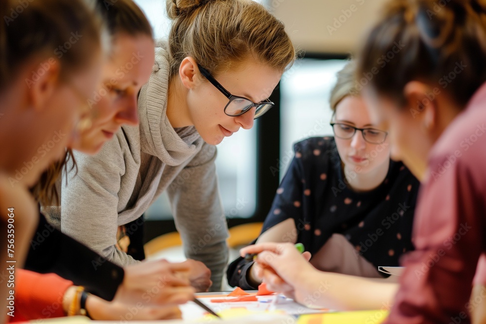 Teamwork in action: A team of professionals collaborating on a task, brainstorming and solving problems together Teamwork in action: A team of professionals collaborating on a task, brainstorming and solving problems together