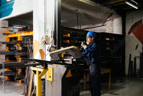Male worker working in workshop at factory