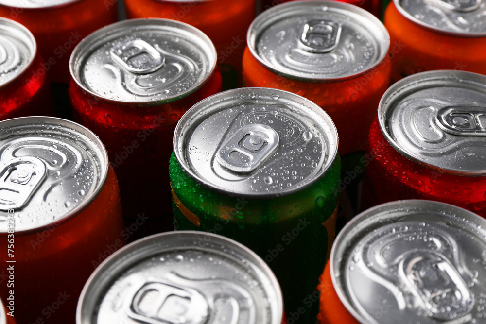 Energy drink in wet cans, closeup. Functional beverage Energy drink in wet cans, closeup. Functional beverage