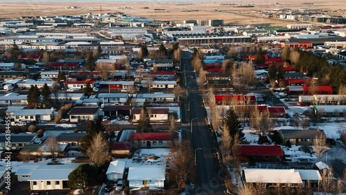 Wonderful city of Selfoss with colorful houses in winter season. Aerial panning shot. Iceland,Europe.