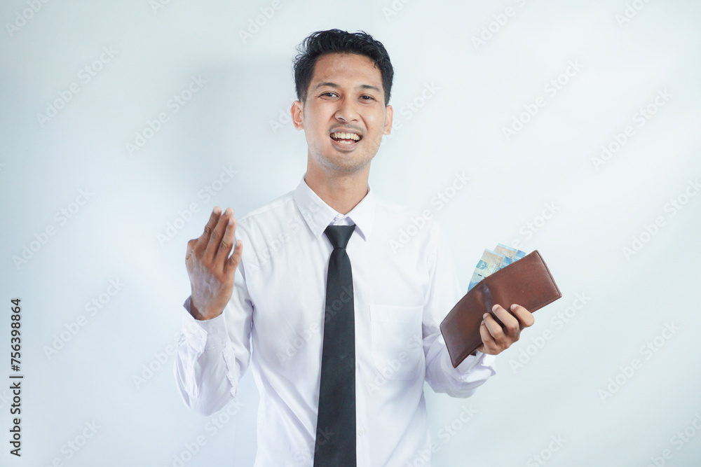 Adult Asian man smiling happy while showing his wallet full of paper money