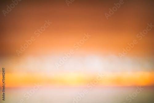Blur abstract gradient orange warm to light color background, tone like sunset and autumn concept, copy space. 
