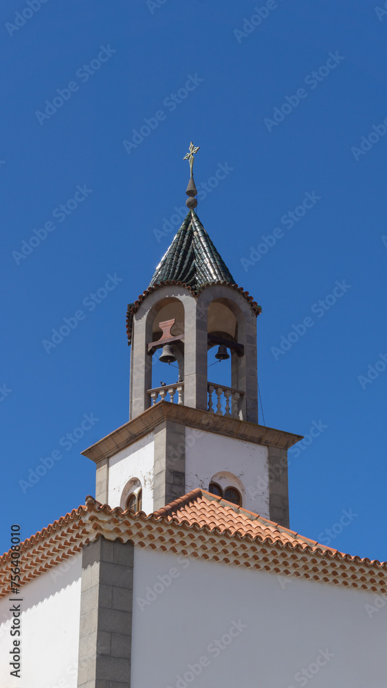 Historic Church Bell Tower Against Blue Sky Historic Church Bell Tower Against Blue Sky