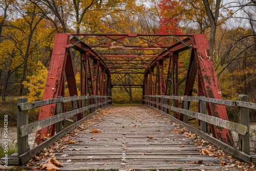 Rustic Red Truss Bridge with Autumn Foliage in Rural