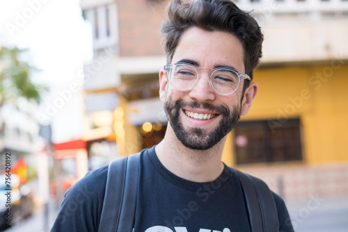 young man happy in the city