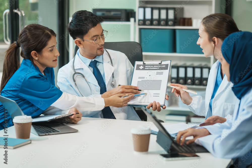 A diverse group of healthcare professionals, including doctors, nurses, and specialists, engaging in a collaborative meeting to discuss medical cases and share expertise in a hospital A diverse group of healthcare professionals, including doctors, nurses, and specialists, engaging in a collaborative meeting to discuss medical cases and share expertise in a hospital