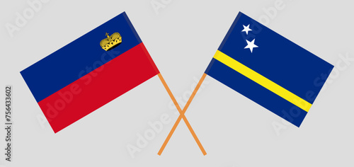 Crossed flags of Liechtenstein and Country of Curacao. Official colors. Correct proportion