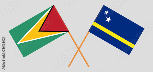 Crossed flags of Guyana and Country of Curacao. Official colors. Correct proportion