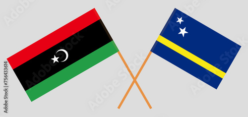 Crossed flags of Libya and Country of Curacao. Official colors. Correct proportion