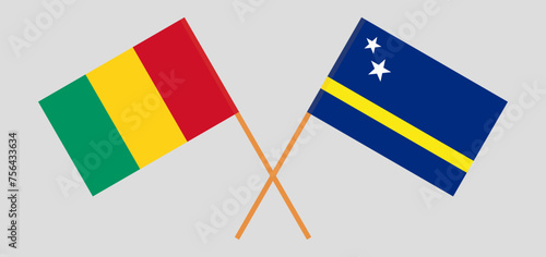 Crossed flags of Guinea and Country of Curacao. Official colors. Correct proportion