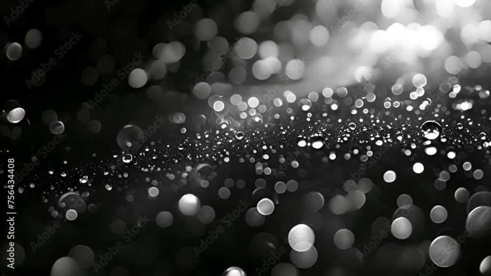 White bokeh particles on black background. Beautiful shine Floating ...