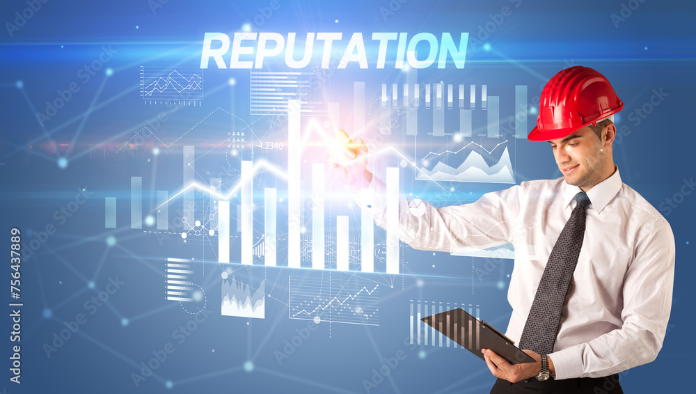 Young businessman with helmet drawing on virutal screen Young businessman with helmet drawing on virutal screen
