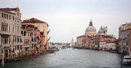 Venice cityscape with Grand Canal waterway, Venetian architecture and boats on the canal. Venice Northern Italy © Nabil