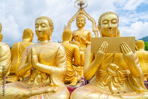 Buddha statues and Buddhist disciples at Phuttha Utthayan Makha Bucha Anusorn, Buddhism Memorial Nakhon Nayok Province Thailand photo