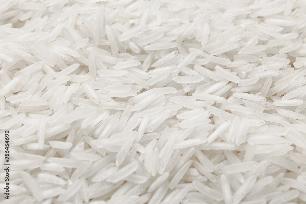Raw basmati rice as background, closeup view