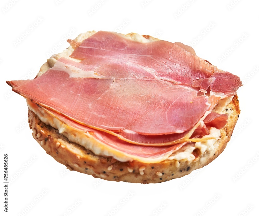 A delicious bagel topped with sliced prosciutto on an isolated white background A delicious bagel topped with sliced prosciutto on an isolated white background