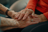 Closeup of senior womens hands showing gesture of love and support