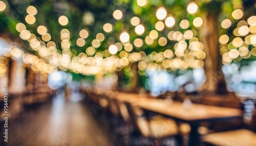 blurred background of restaurant with abstract bokeh light lights decoration party event festival holiday blur background outdoor string lights digital photo
