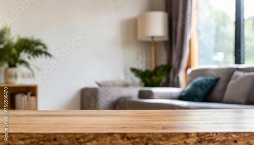 empty mockup space on a tabletop with a blurred comfortable living room as a background