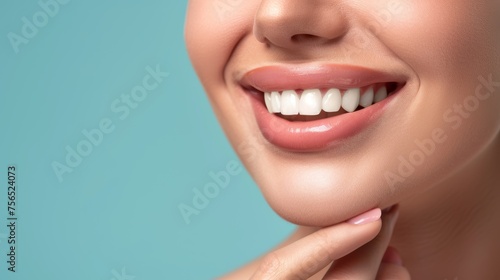 Close up shot of a woman s smile with white healthy teeth isolated on a light background. Banner for dentistry