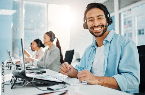 Call center, customer support and portrait of man on laptop for consulting, networking and online help in office. Telemarketing, communication and happy worker for CRM business, service and sales photo