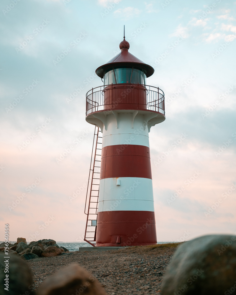 Leuchtturm am Strand Sonnenuntergang