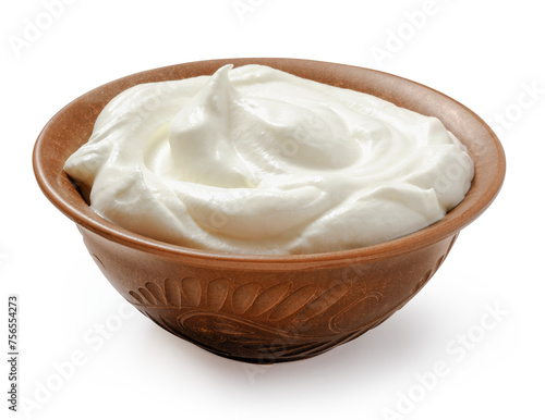 Sour cream or yogurt in ceramic bowl isolated on white background