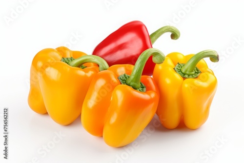 a bunch of yellow and red bell peppers on a white background with a shadow. isolated vegetables.