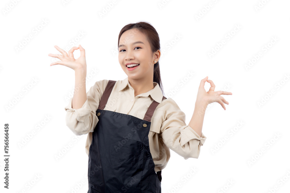 Portrait smiling young asian woman wearing apron showing ok sign with hand isolated white background, young asian woman making okay gesture, waitress or entrepreneur, small business or startup. Portrait smiling young asian woman wearing apron showing ok sign with hand isolated white background, young asian woman making okay gesture, waitress or entrepreneur, small business or startup.