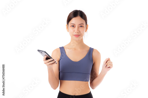 A fit young asian woman in sportswear using a smart phone, possibly managing her fitness routine isolated white background, active woman using smartphone in sportswear, sport and health.