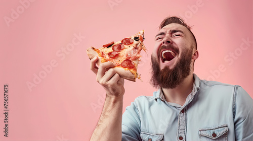 Man holding a piece of pizza in his hands
