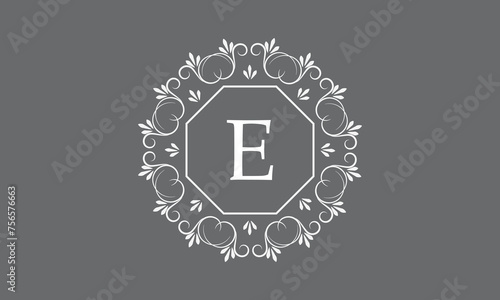 Vector illustration of logo template with monogram element, letter E and floral ornament for restaurant, club, boutique, cafe, hotel cards.