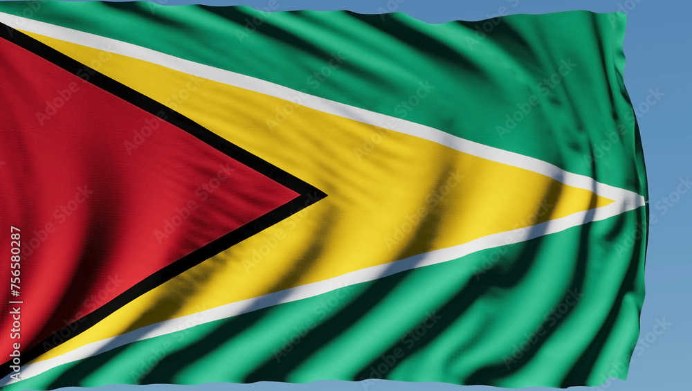 Close-up of the national flag of Guyana flutters in the wind on a sunny day Close-up of the national flag of Guyana flutters in the wind on a sunny day