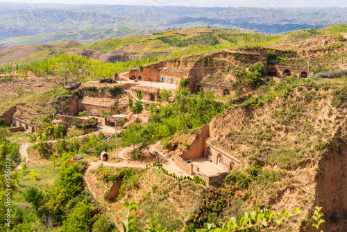 The original cave village on the edge of the Yellow River in Shilou County, Luliang, Shanxi photo