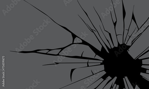 Broken glass hole on dark surface background. crack effect radiates.
