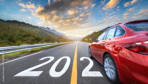 Blurred motion highway with red car, and new year number 2024, on the road  © blackdiamond67