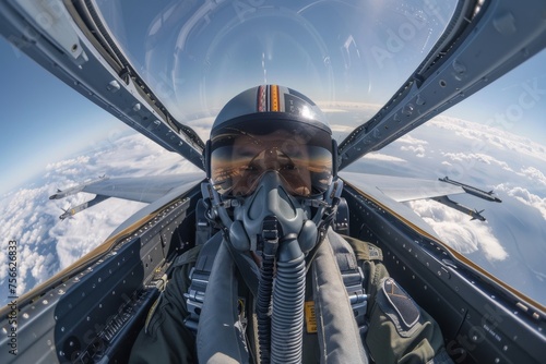 Joyful pilot in the cockpit during fighter jet takeoff against a clear blue sky © Georgii