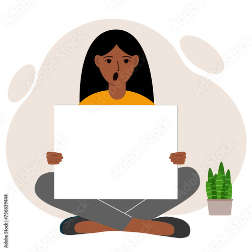 A woman sits cross-legged and holds a large white sheet with space for text. Advertising, poster, information, announcement.