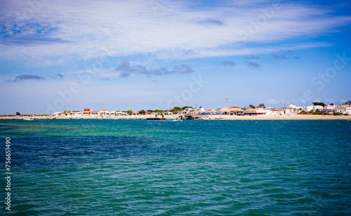 view of armona island beach from the sea in algarve photo